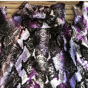 Beautiful Jennifer Lopez purple snake top